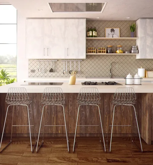 kitchen island with 4 bar stools and white cabinetry on the wall behind
